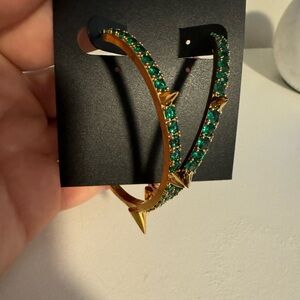 NWT spiked hoop earrings with green CZ